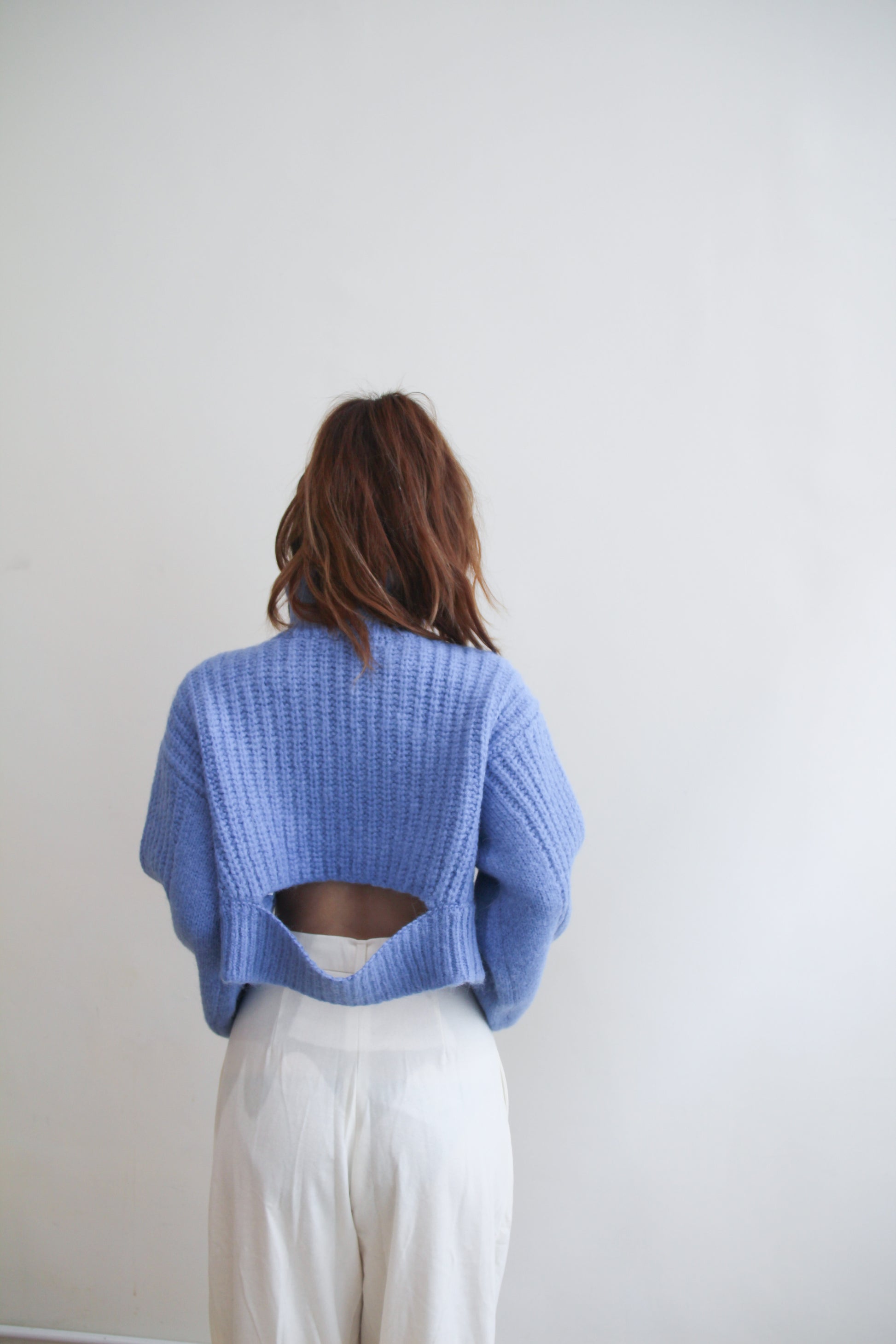 Wave with Cut-out Hem Sweater