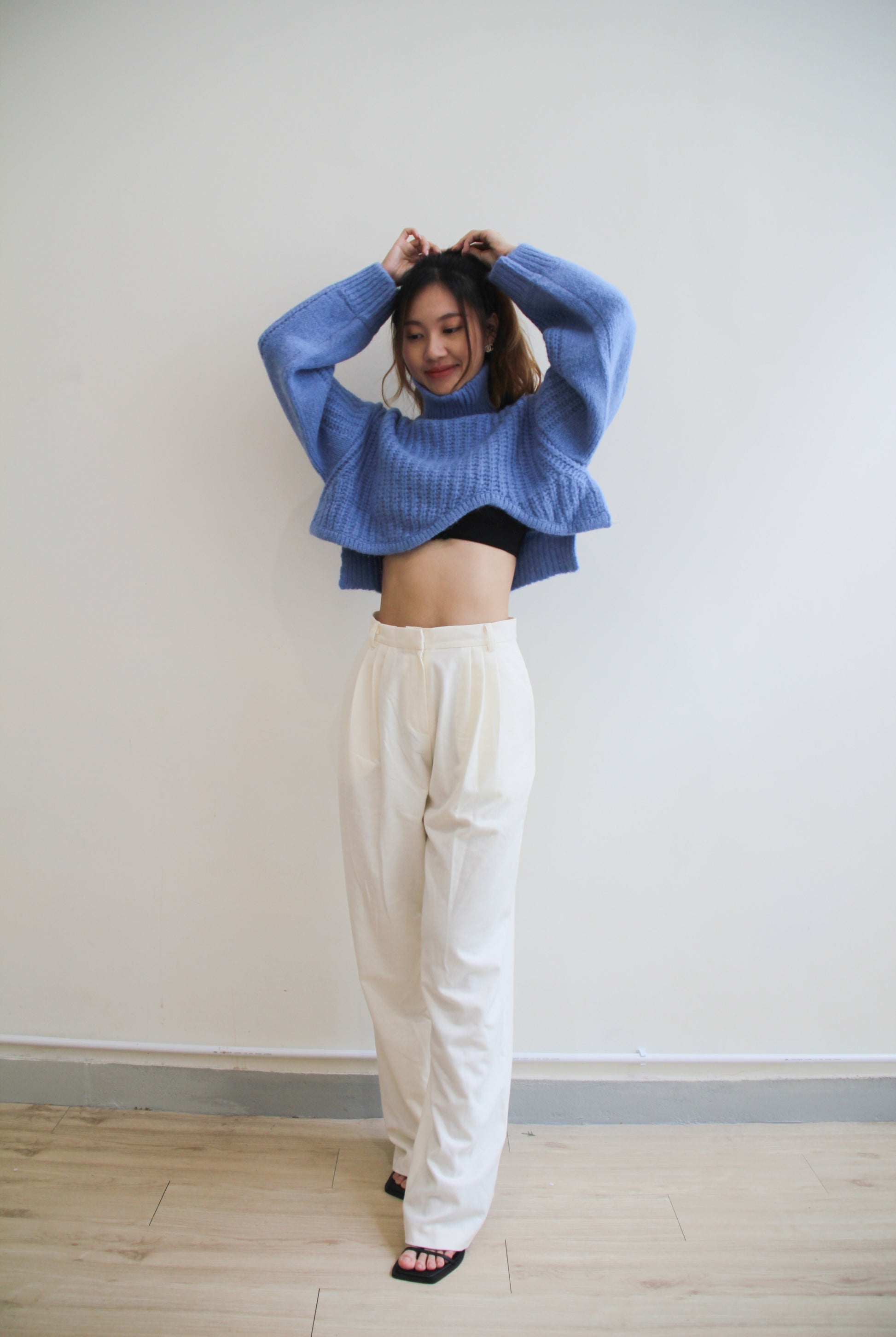Wave with Cut-out Hem Sweater
