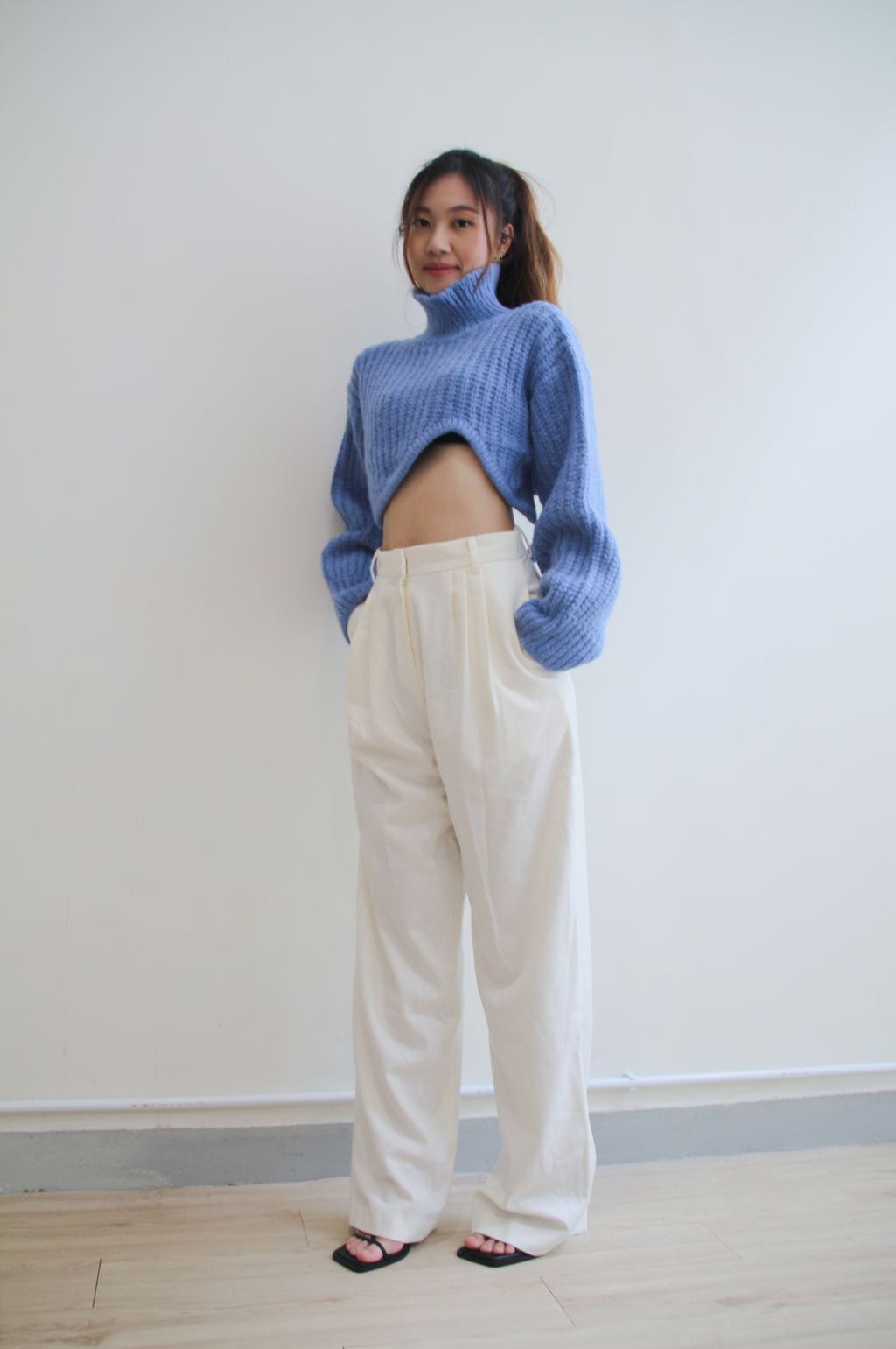Wave with Cut-out Hem Sweater