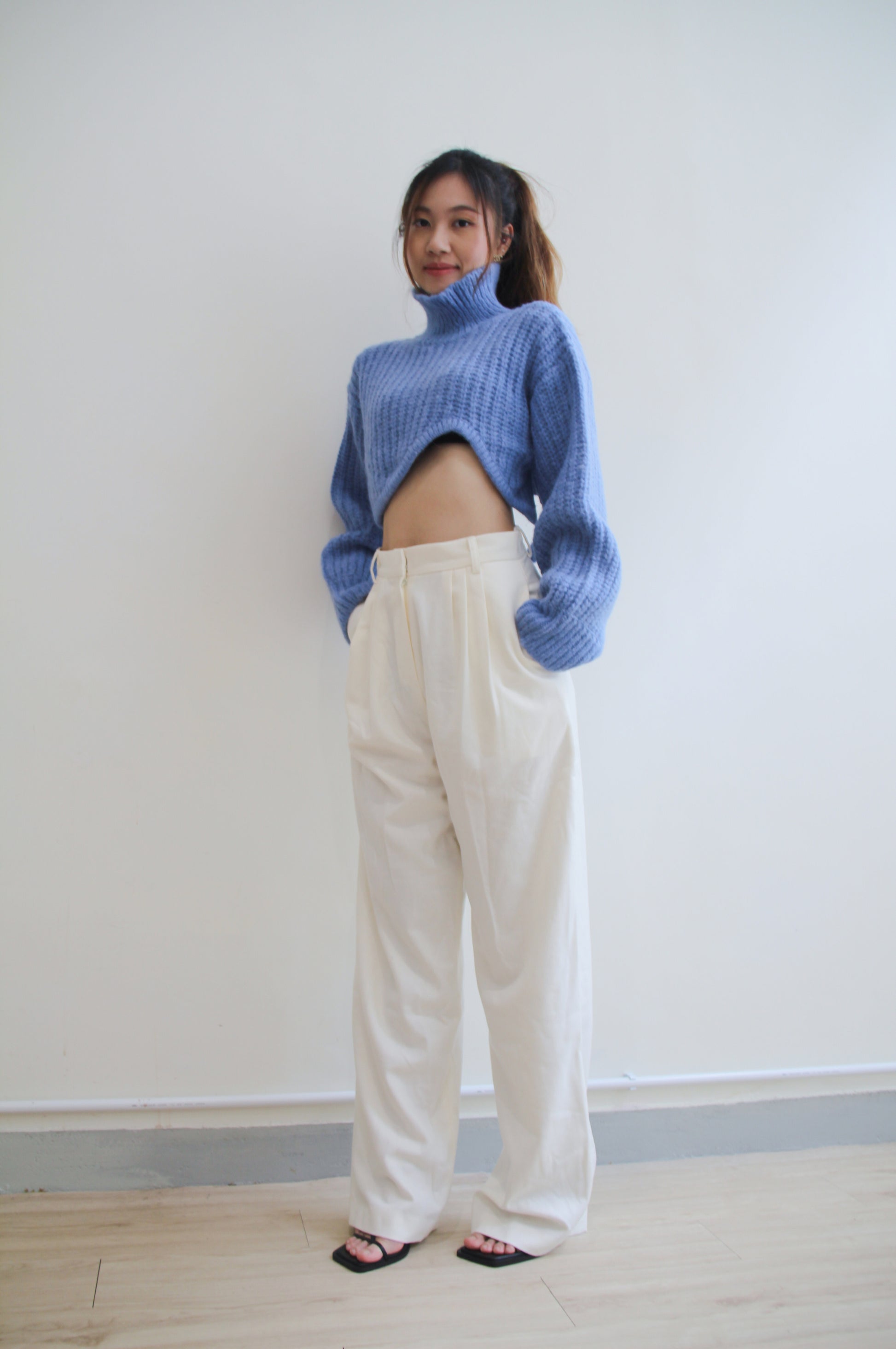 Wave with Cut-out Hem Sweater