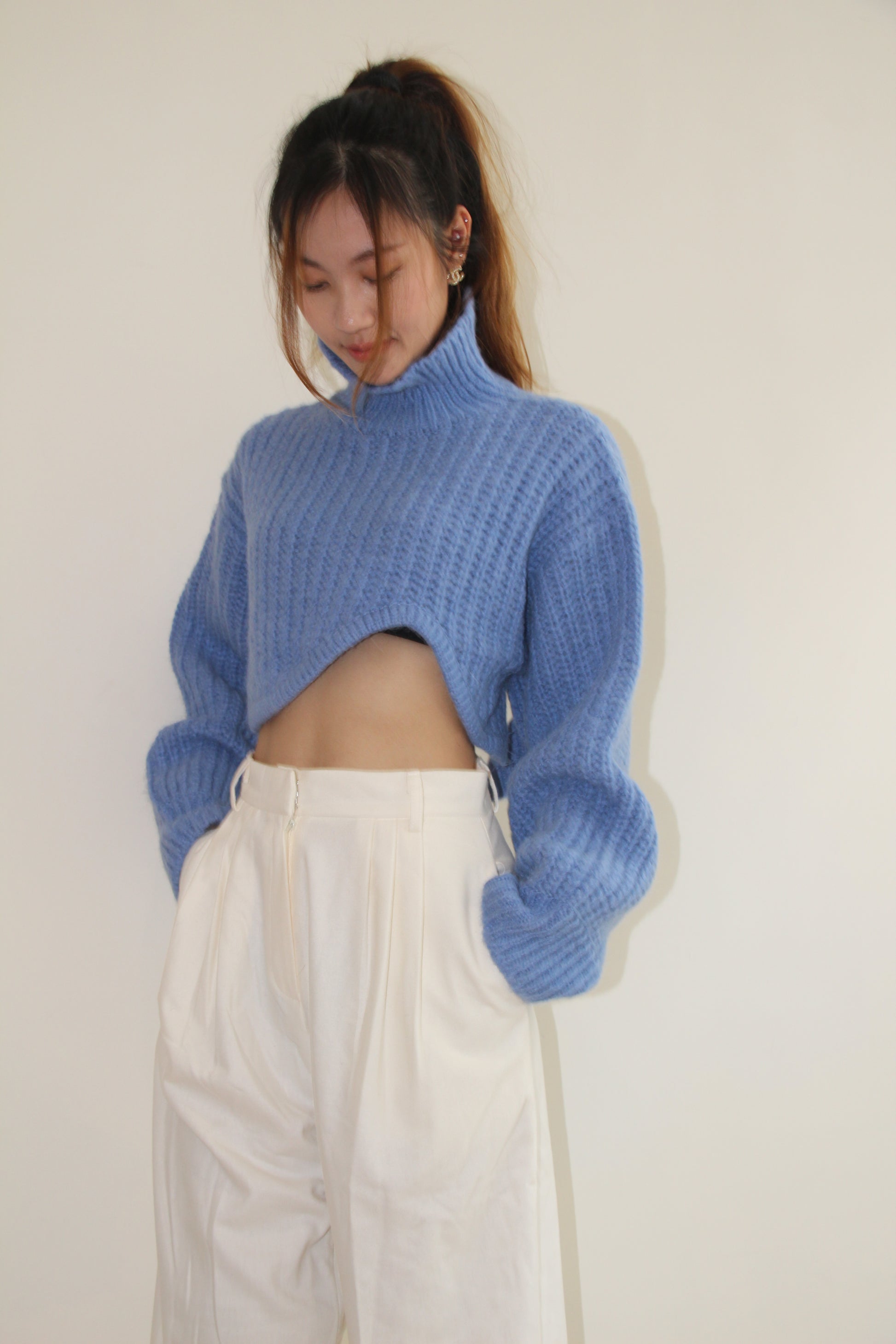 Wave with Cut-out Hem Sweater